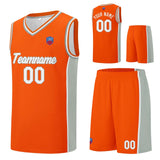 Custom basketball jersey shorts for men and women. Embroidered and printed name, number and logo Orange&Grey